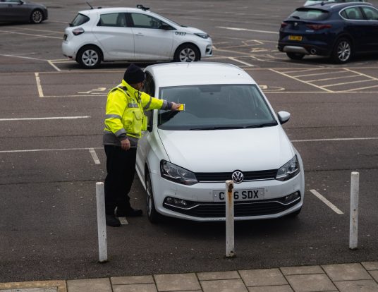 Is it allowed to take pictures of parking violators?